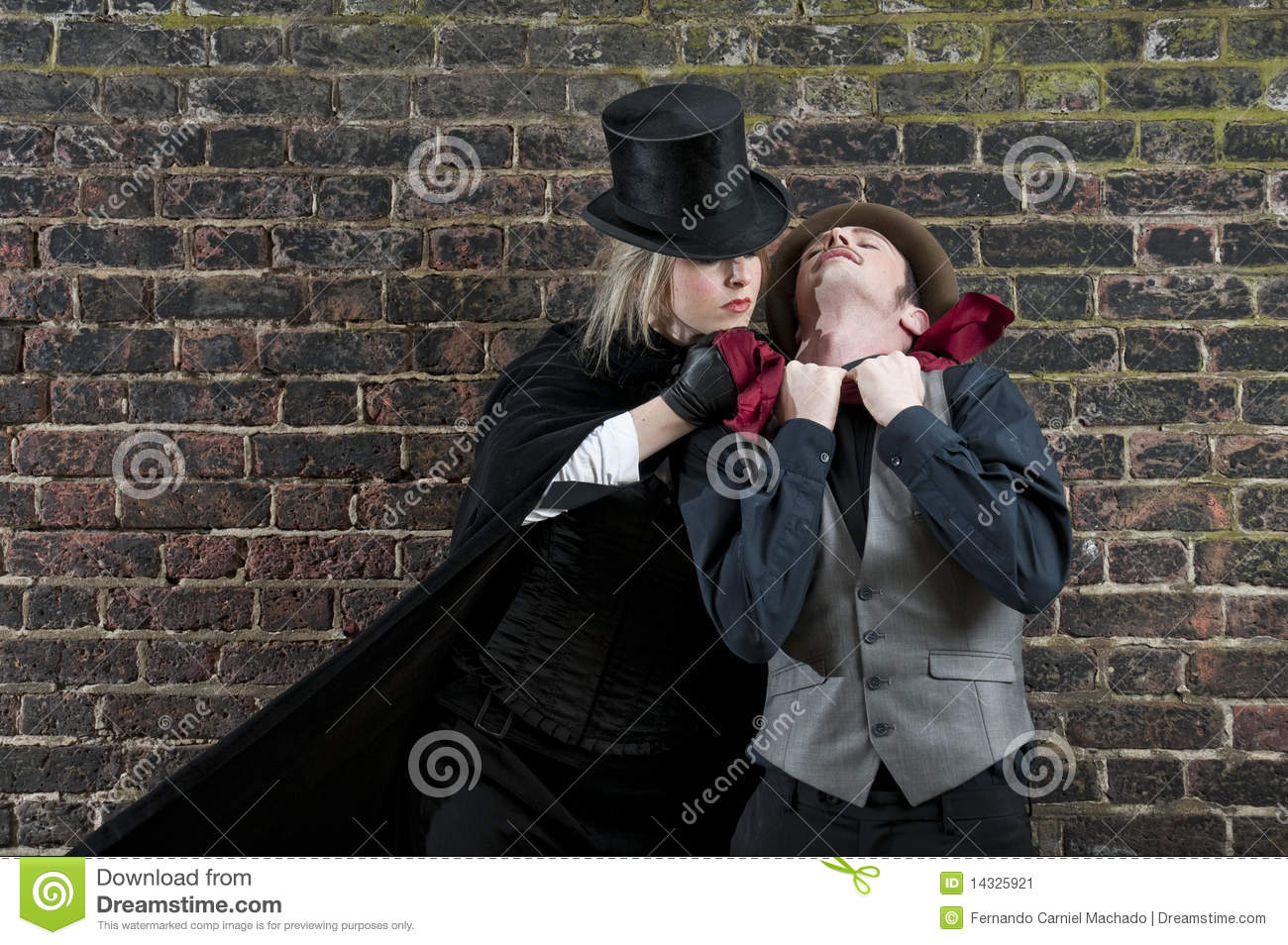 Fashion Shot Of Woman Dressed As Jack The Ripper Strangling Man