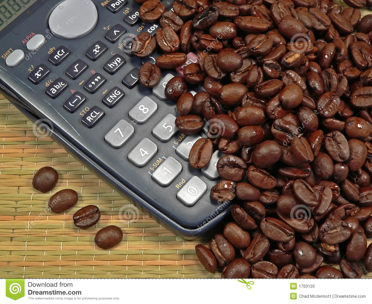 Coffee Beans With A Calculator Being Accounted For  Concept For