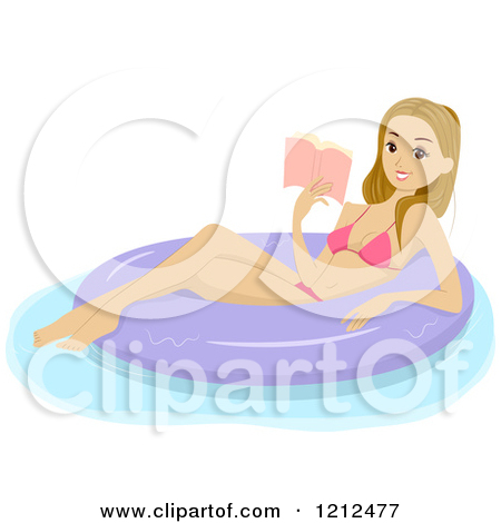 Happy Young Woman In A Bikini Reading A Book On An Inner Tube