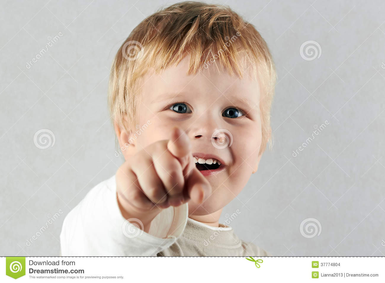 Handsome Happy Blond Boy Points Forward By Finger Stock Images   Image