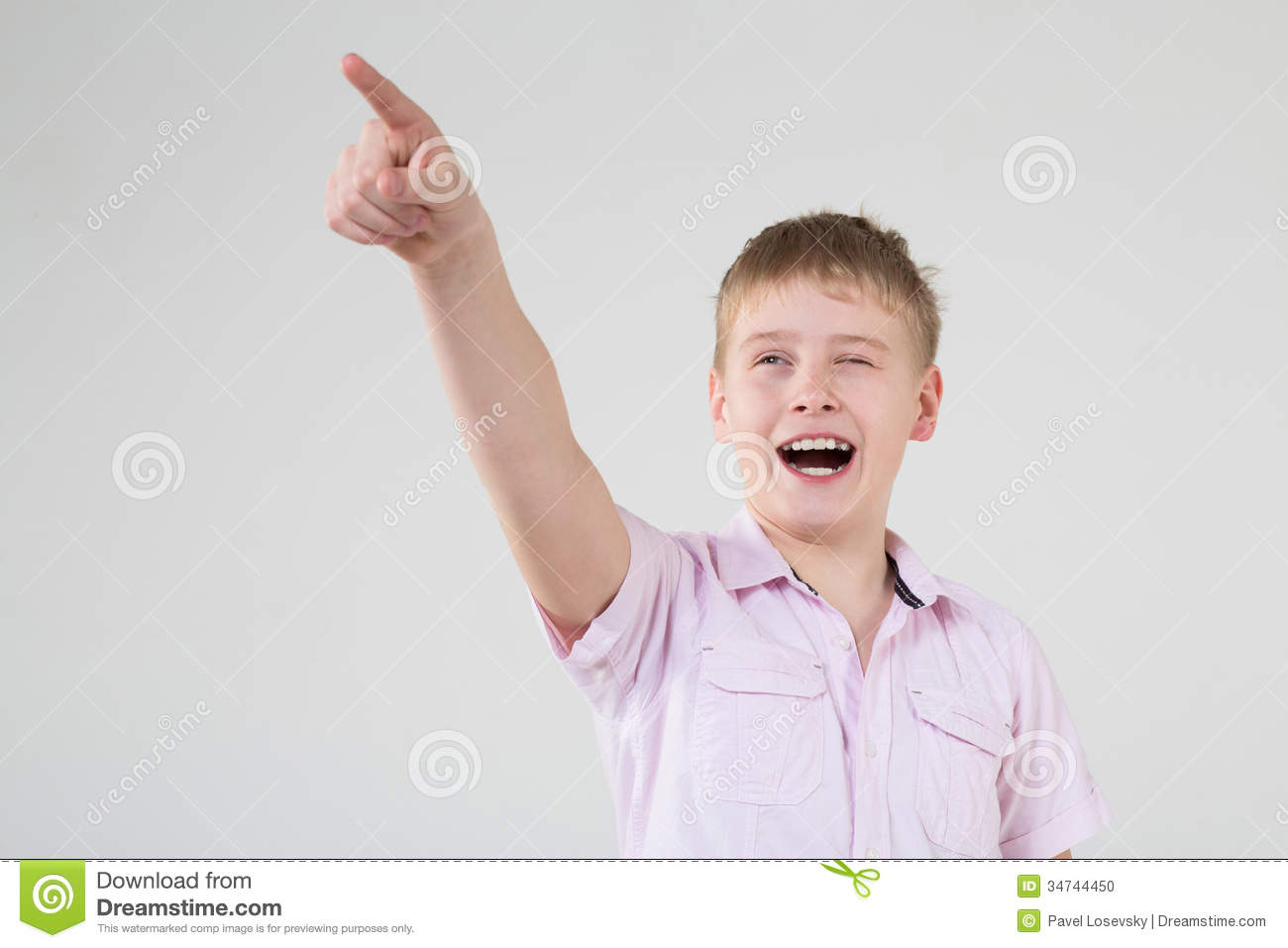 The Boy Squinted And Points A Finger Somewhere Stock Photo   Image