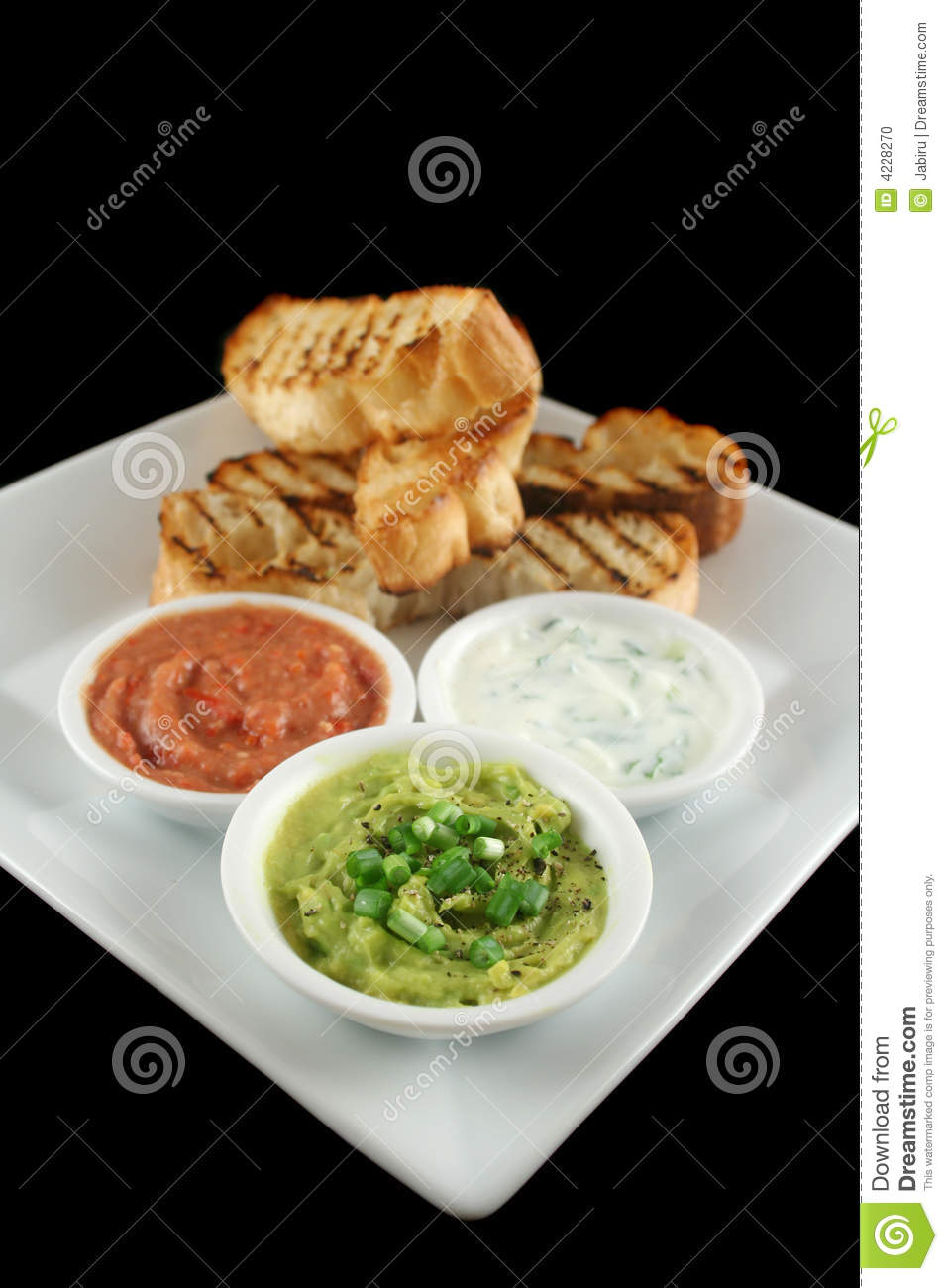 Delicious And Colorful Trio Of Dips With Grilled Turkish Bread 