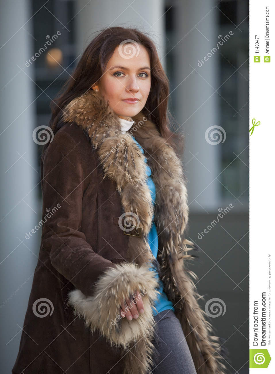 Fashion Woman In Fur Coat On The Street Royalty Free Stock Photography