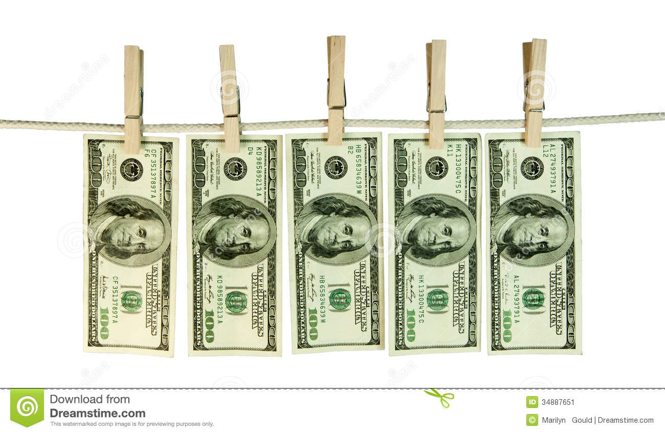 Five Us One Hundred Dollar Bills In Varying Shades Of Green And Use