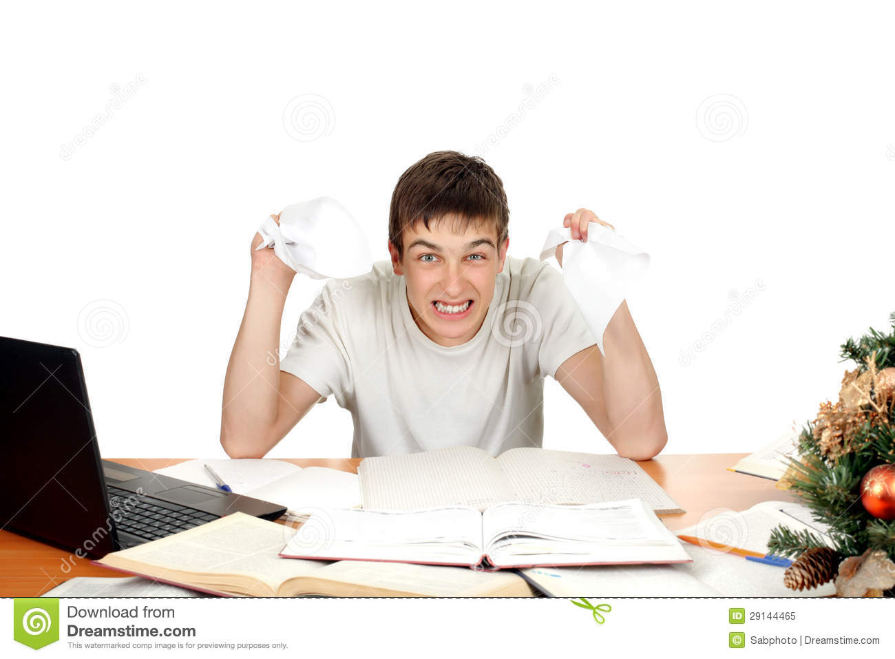 Angry Student With Rumpled Papers In His Hands  Isolated On The White