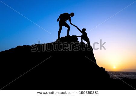 Couple Hiking Help Each Other Silhouette In Mountains Sunset And