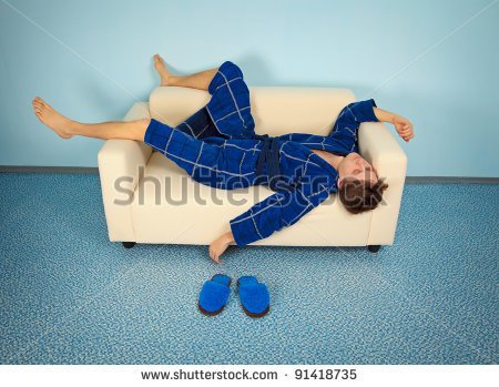 Funny Man Resting At Home On The Couch   Stock Photo