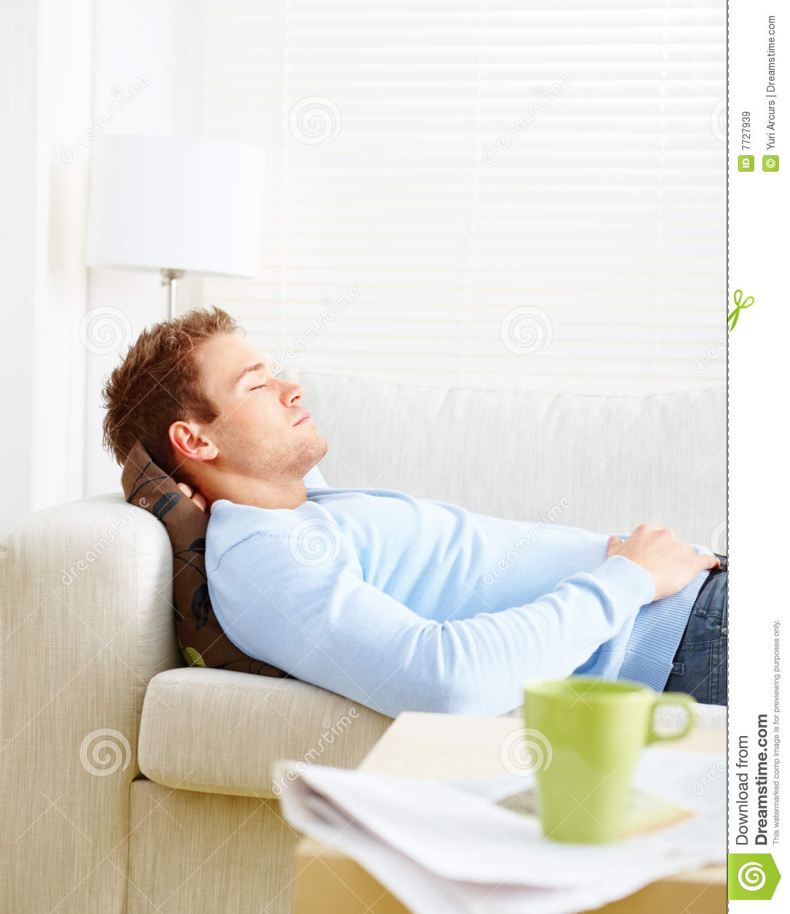 Stock Images  A Man Asleep On The Living Room Couch  Image  7727939