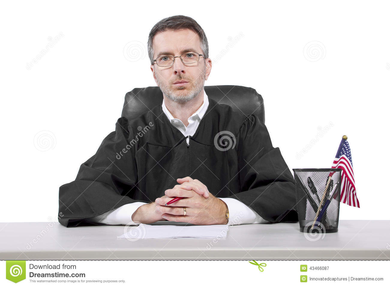 Middle Aged Caucasian American Judge In A Robe Sitting 