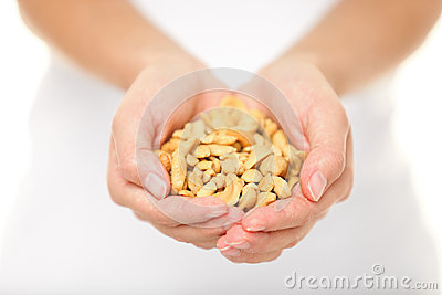 Cashew Nuts   Woman Showing Salty Cashew Nuts Handful  Healthy Food