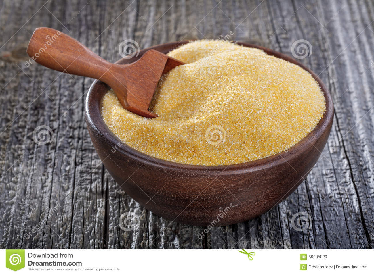 Corn Grits Polenta In A Wooden Bowl On Old Wooden Table 