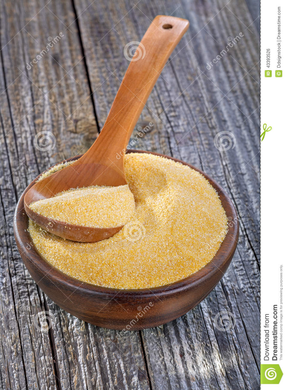 Corn Grits Polenta In A Wooden Bowl On Old Wooden Table