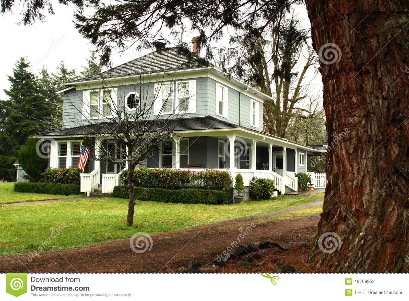 Large Country Home With Wide Wrap Around Porch Stock Photography    