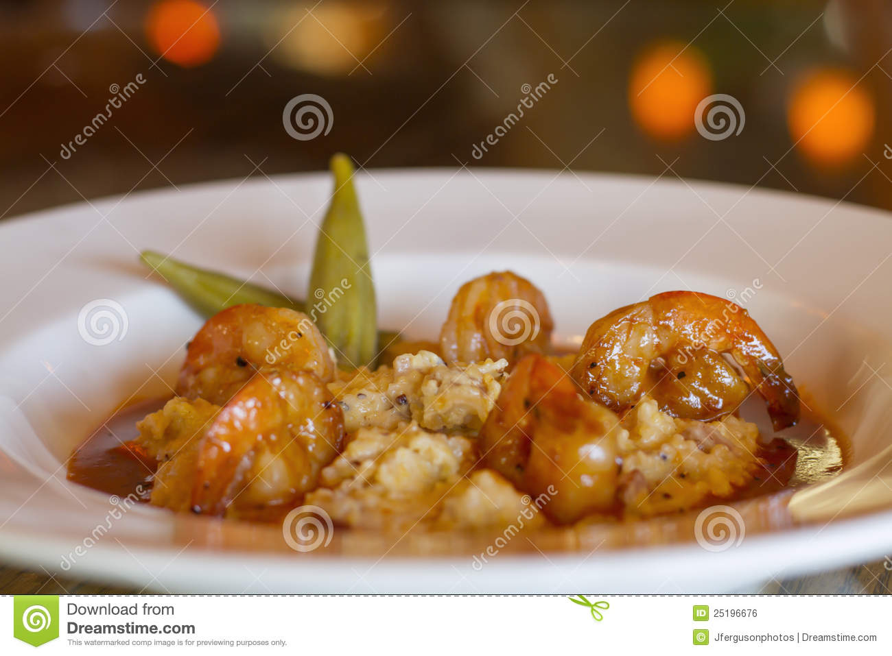 Shrimp And Bacon Cheddar Grits In Lobster Tomato S Royalty Free Stock    