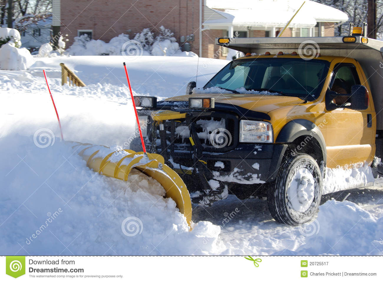 Local Snow Plow Clearing The Road After A Heavy Snow Storm