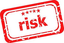 Risk Red Rubber Stamp Over A White Background