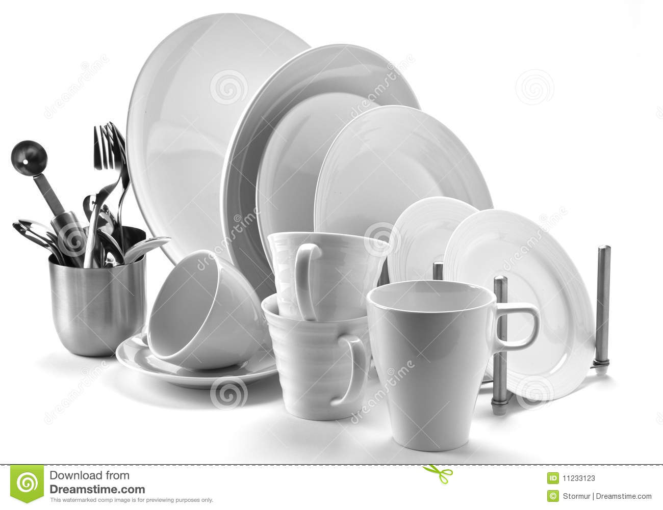 Set Of Fresh Washed Plates And Cutlery Isolated On White