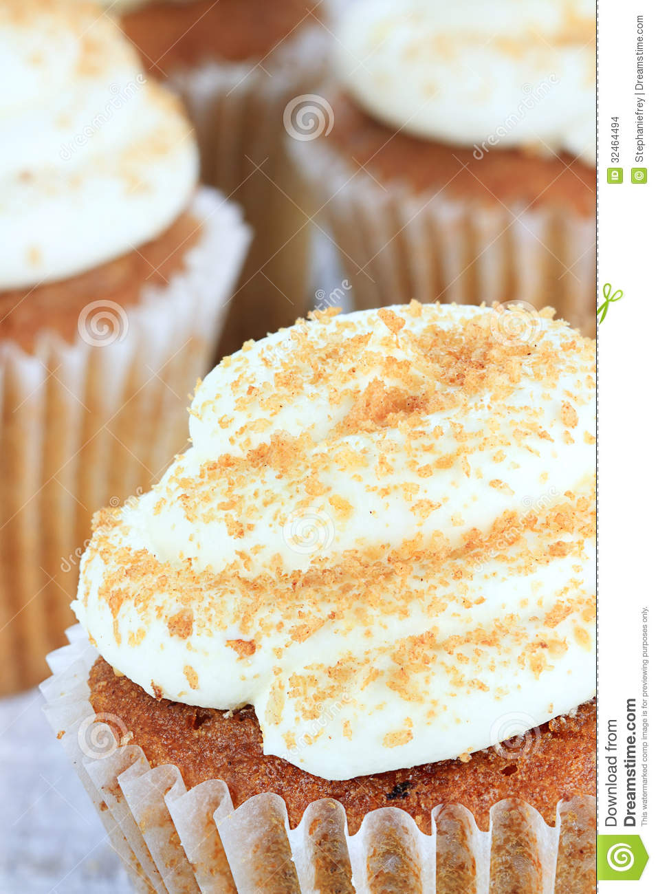 Pumpkin Spice Cupcakes Frosted With Cream Cheese Icing And Sprinkled