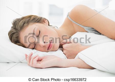 Stock Photo   Cute Peaceful Woman Napping Lying Under The Cover On Her
