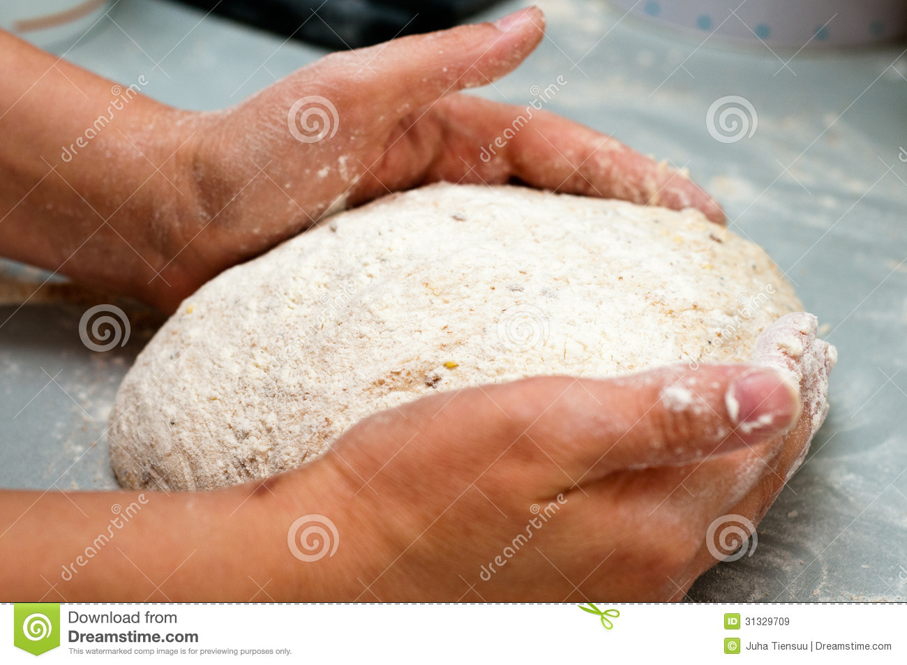 Around A Piece Of Dough Shaping It Into A Beautiful Loaf Of Bread