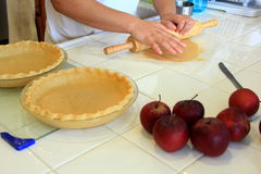 Person Kneading A Pie Crust For An Apple Pie Stock Photos