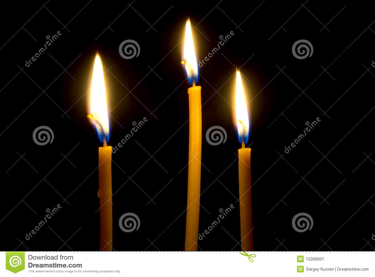 Three Burning Church Waxy Candles Close Up Illuminate The Darkness