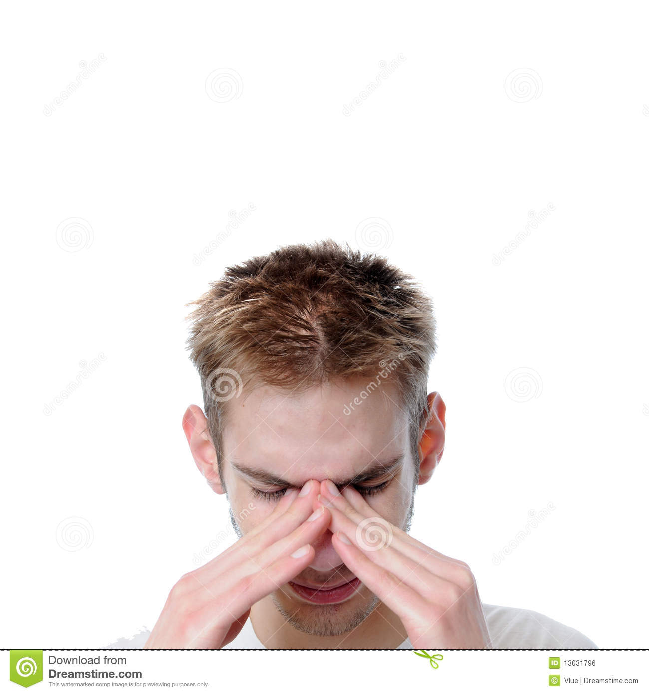 Young Adult Man Stressed  He Rubs His Eyes In Pain  Isolated On White