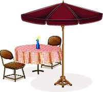 Table With An Umbrella In A Cafe