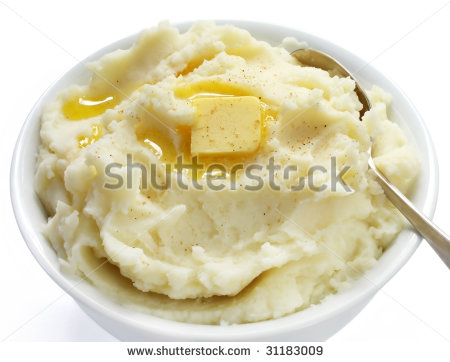 Bowl Of Mashed Potato With Melting Butter And A Sprinkle Of Nutmeg