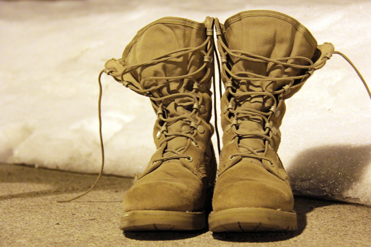 Photo By Rachel Torgerson  A Pair Of Army Combat Boots Lie Near A