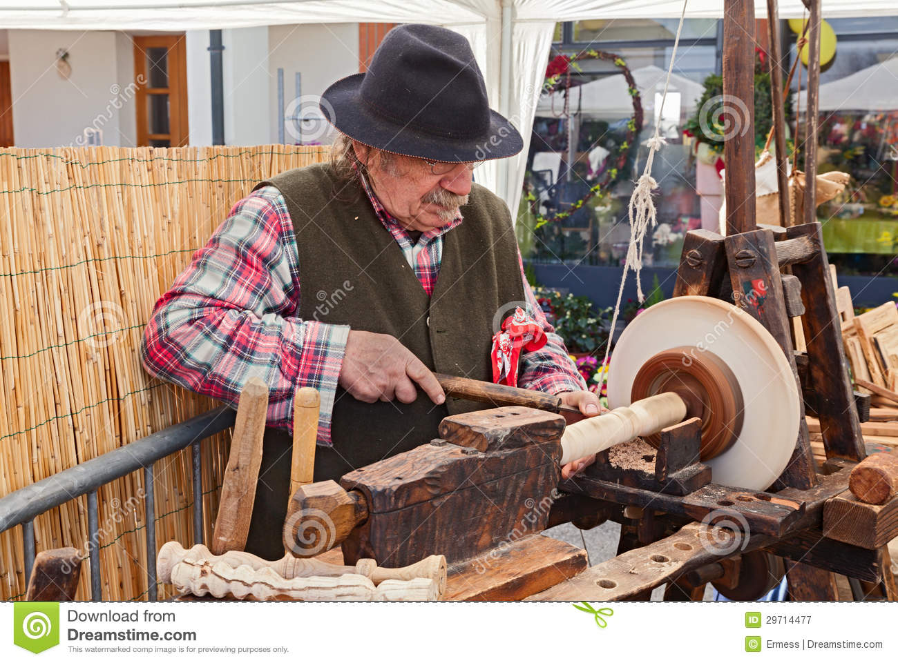 Recalling Of Ancient Craft  An Artisan Working The Wood With An    