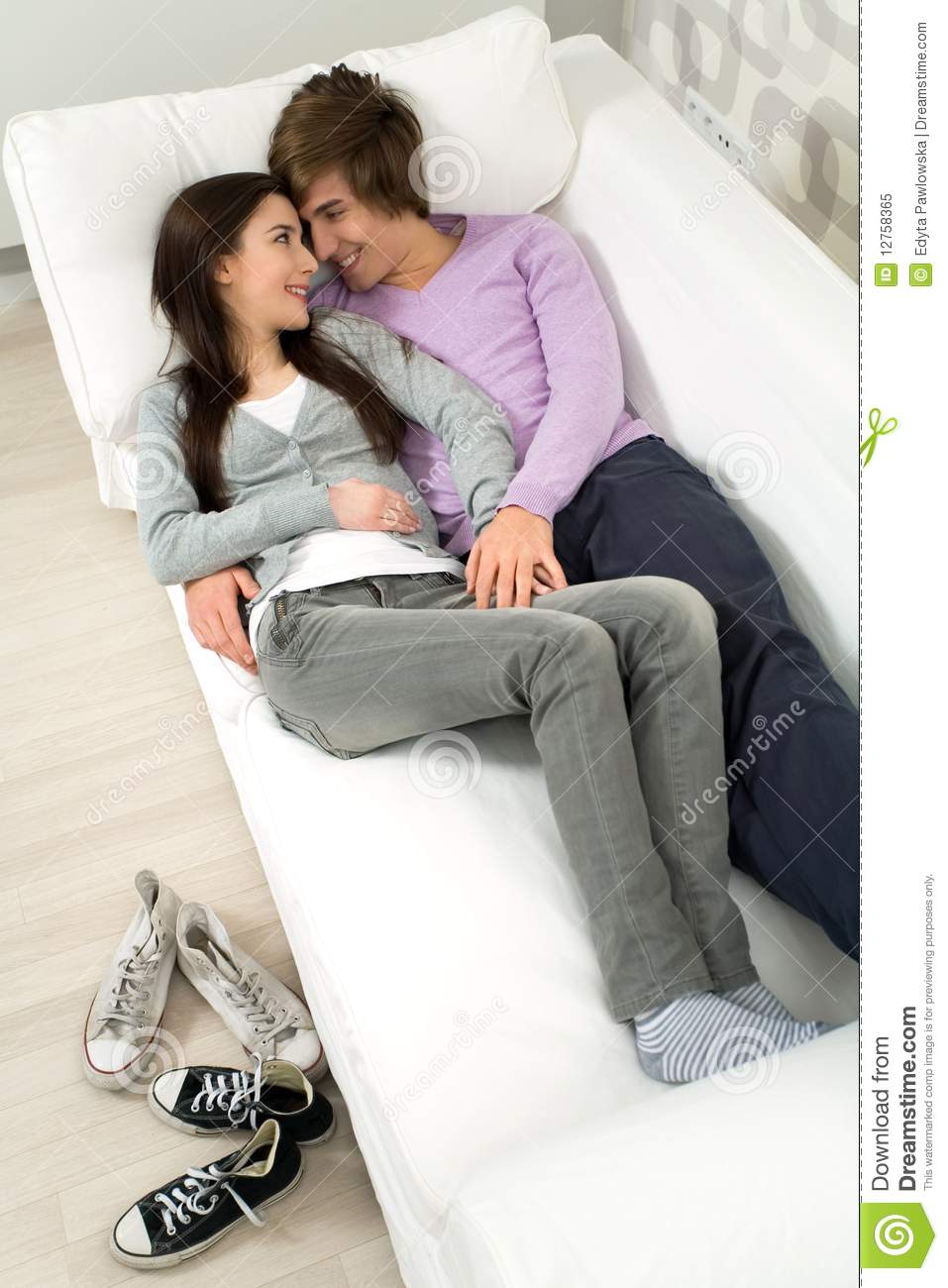 Couple Lying On Couch Royalty Free Stock Photo   Image  12758365