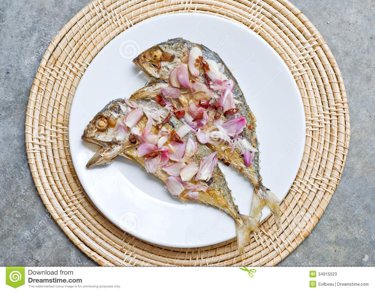 Deep Fry Two Mackerel Fish Topping With Sliced Shallot And Chilli On    