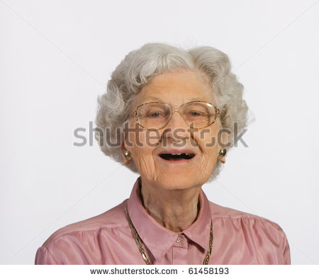 Old Woman With Glasses And Gray Hair Happy And Smiling Stock Photo