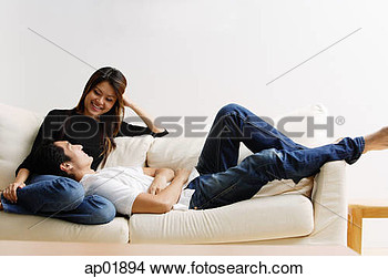 Stock Photo   Couple On Sofa Man Lying On Womans Lap  Fotosearch