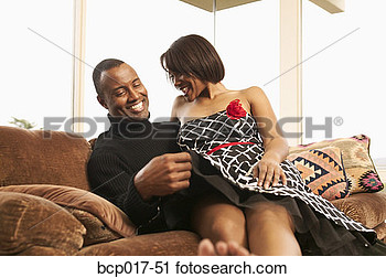 Stock Photography Of A Couple Cuddling On The Sofa  Bcp017 51   Search