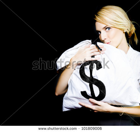 Studio Image Of A Business Woman Kissing A Money Bag Full Of Monetary    