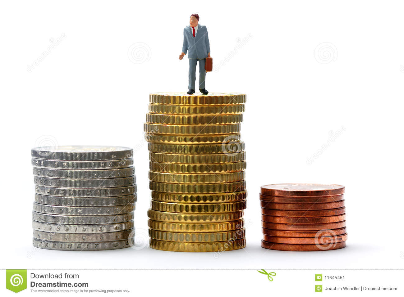 Successful Businessman Figurine Standing On A Stack Of Euro Coins 