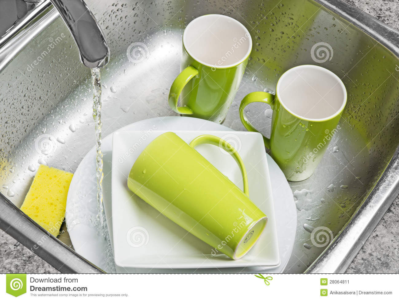 Washing Green Cups And White Plates In The Kitchen Sink  Water Running