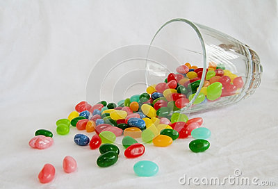 Jelly Beans Spill From Short Glass Stock Photo   Image  28994120