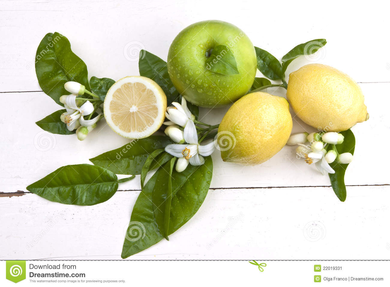 Lemons And Apple Composition With Lemon Blossoms On A Rustic Wooden    