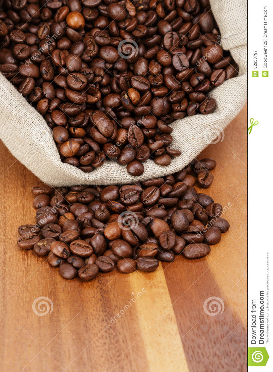 Roated Coffee Beans Spill Out Of The Bag Royalty Free Stock