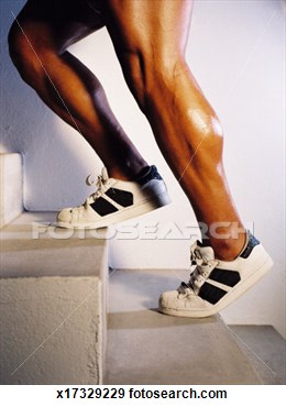 Stock Photograph Of Muscular Definition Of A Man Legs Climbing Stairs