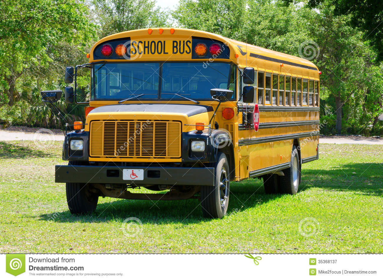 Summer Camp School Bus In Grass Field Royalty Free Stock Photography