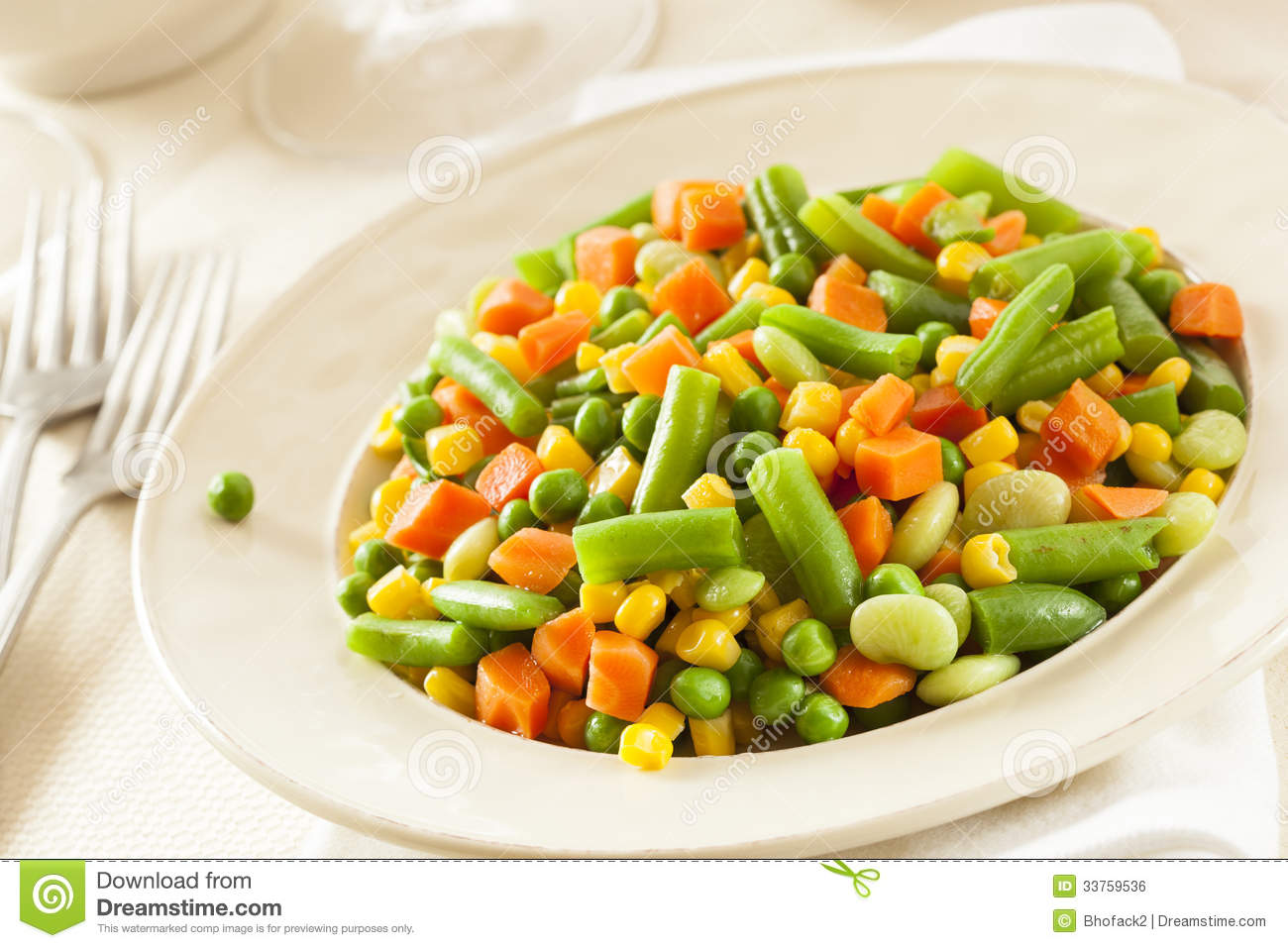 Steamed Organic Vegetable Medly With Peas Corn Beans And Carrots