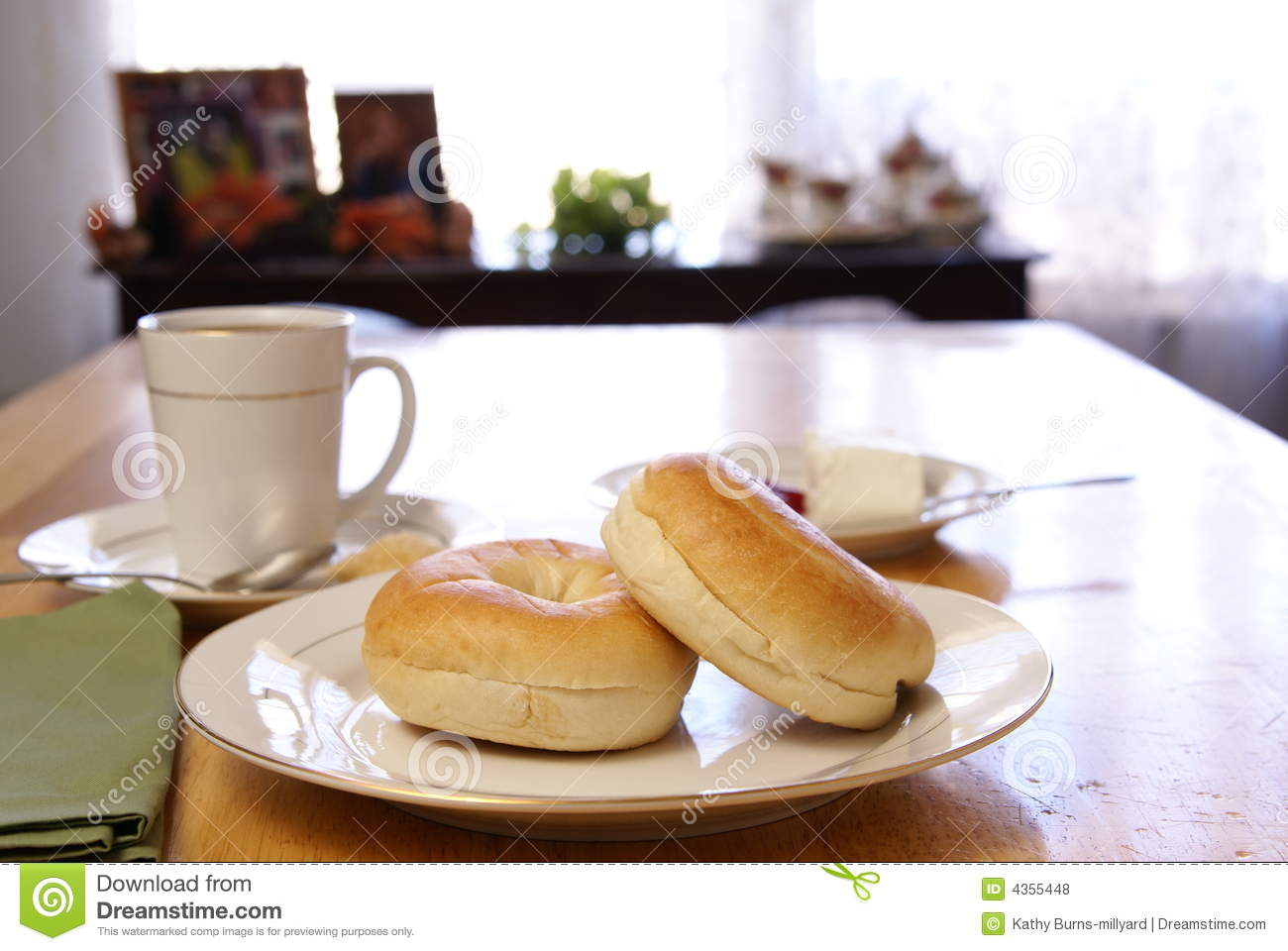 Breakfast Of Plain Bagels With Coffee Cream Cheese And Strawberry