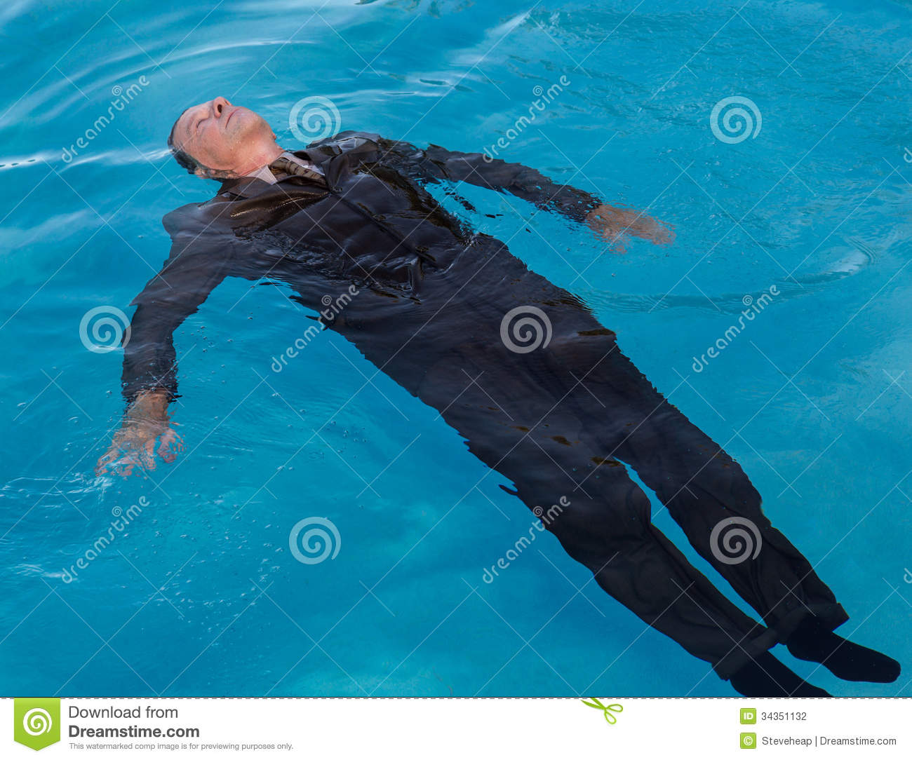 In Deep Blue Pool Looking Like Drowning As A Result Of Problems