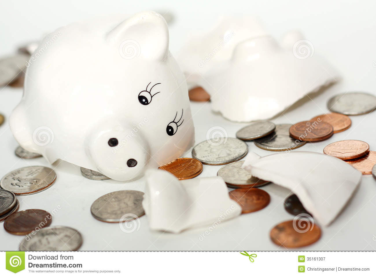 Broken Small Piggy Bank Surrounded By Spilled Coin Royalty Free Stock