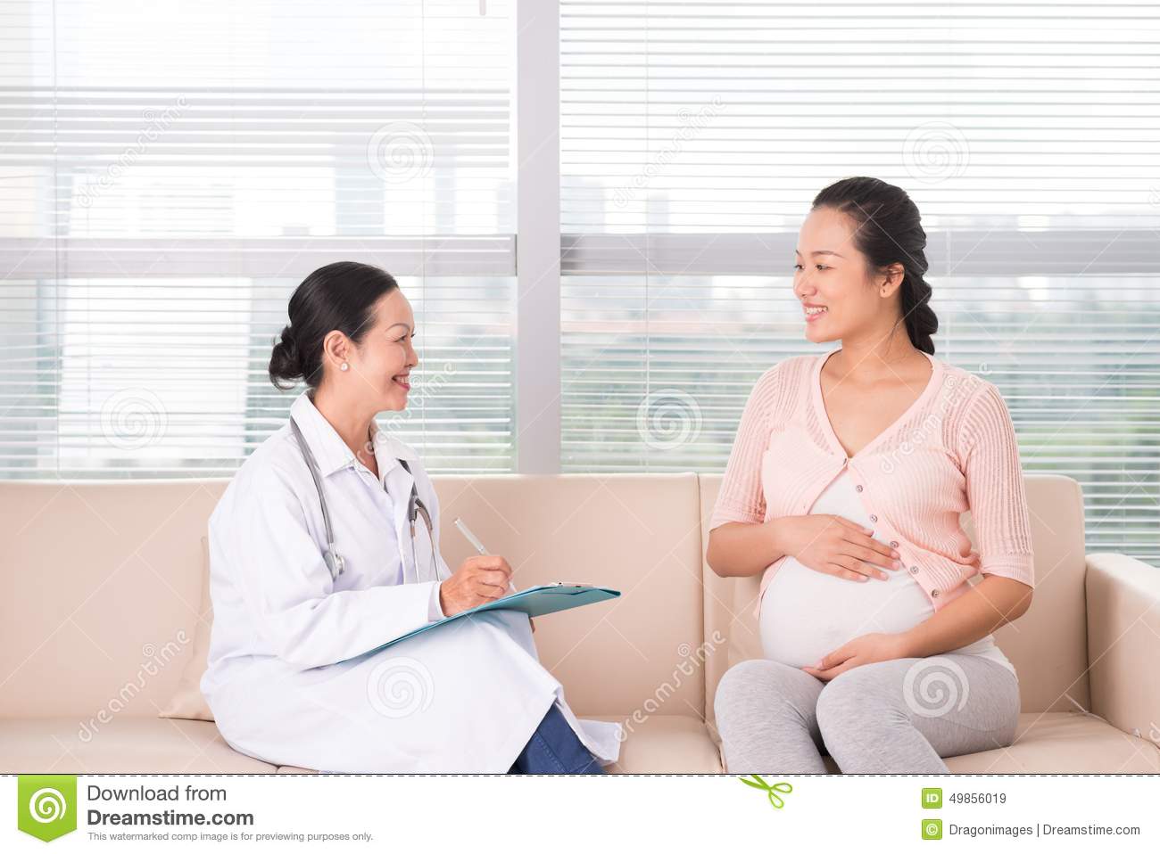 Pregnant Woman Having Consultation Stock Photo   Image  49856019