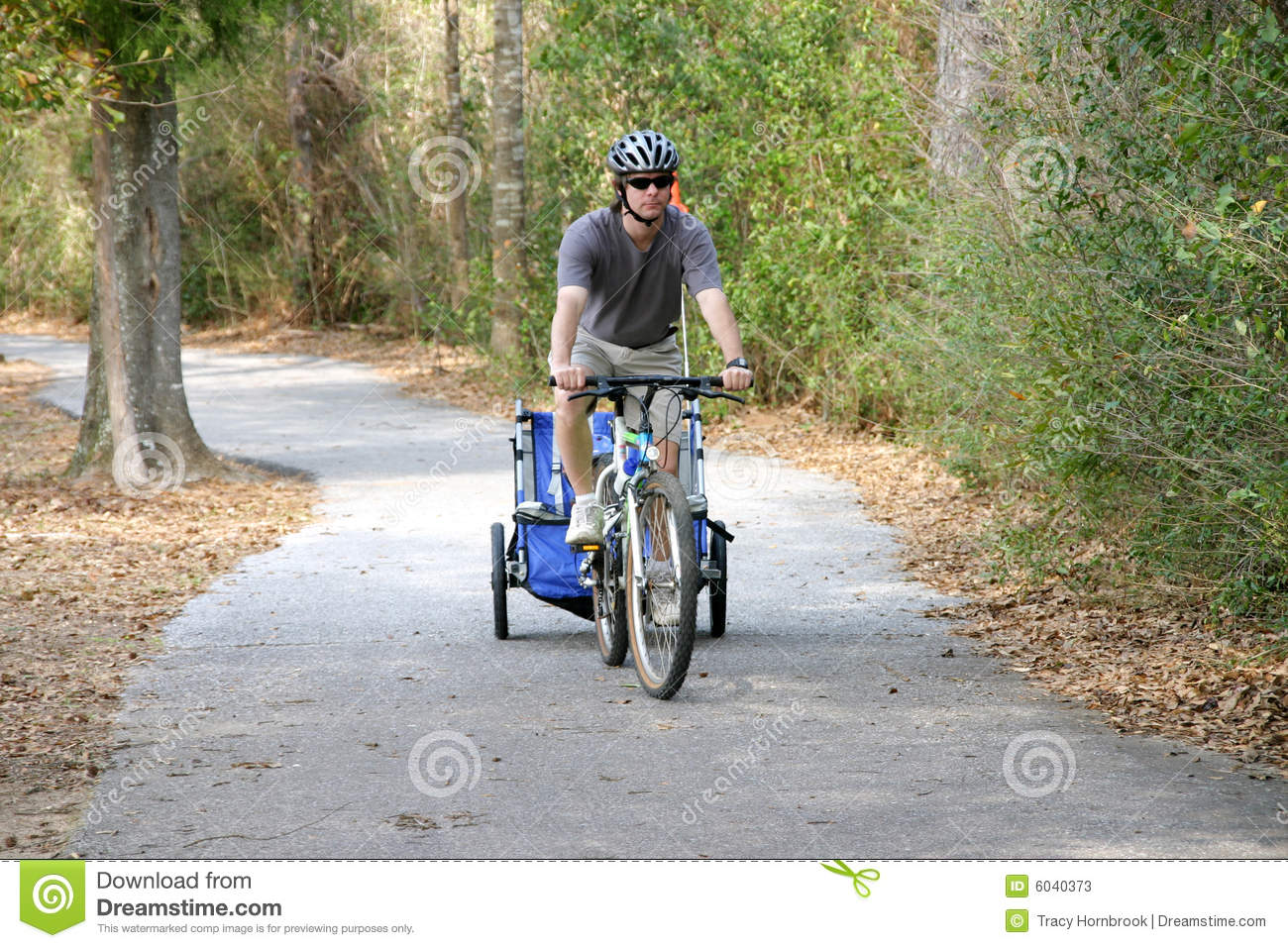 Caucasian Father And Son Enjoying A Bike Ride On A Country Bike Trail